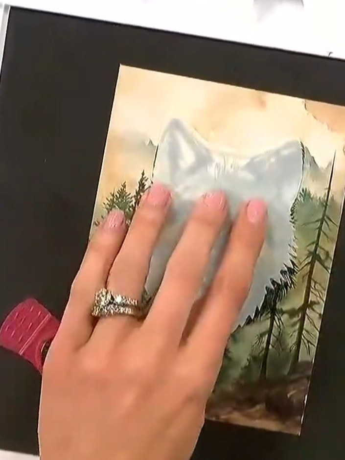 Step 4: Using a brush, apply white ink around the wolf image to create a halo effect. This will help the wolf stand ou