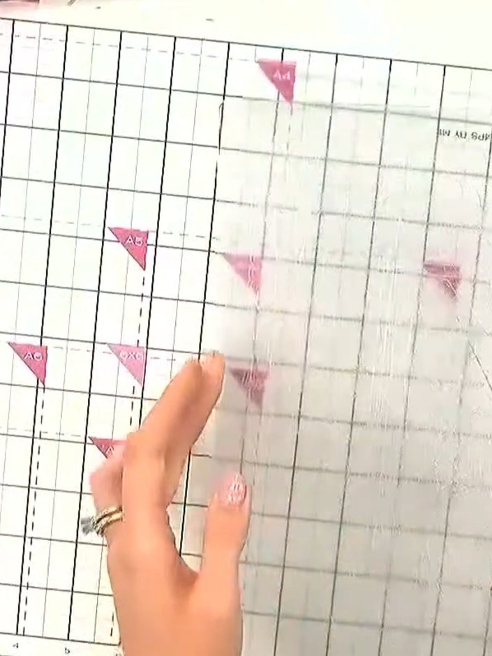 Step 2: Place your card inside the embossing folder, then insert the folder into the die cutting and embossing machine