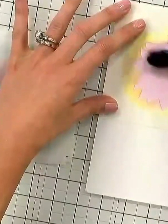 Step 2: Position the first stencil (marked number 1) onto your white card base. Use the small heart registration marks