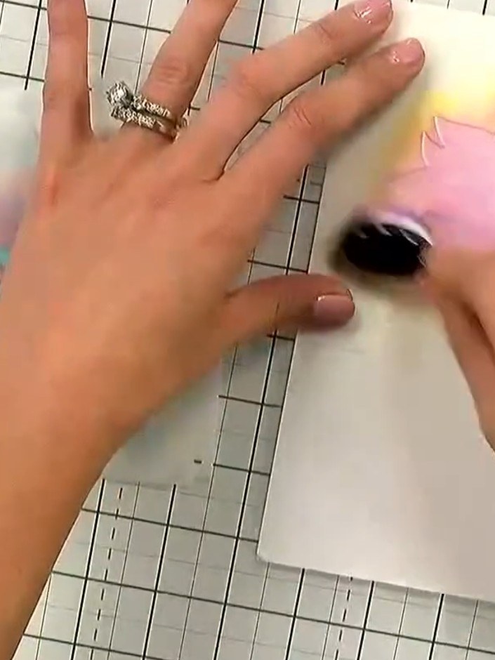 Step 3: Apply pink ink through the flower stencil using a blending brush, working the colour over the petals to create