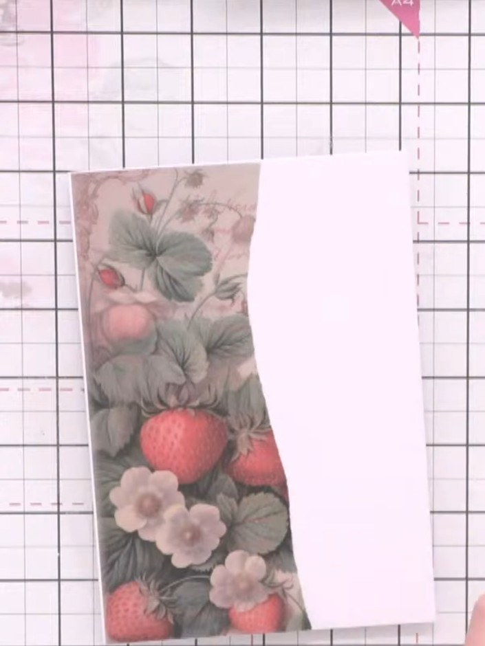 Step 7: Layer additional vellum pieces on top of the base card for extra visual interest. Position the decorative stra