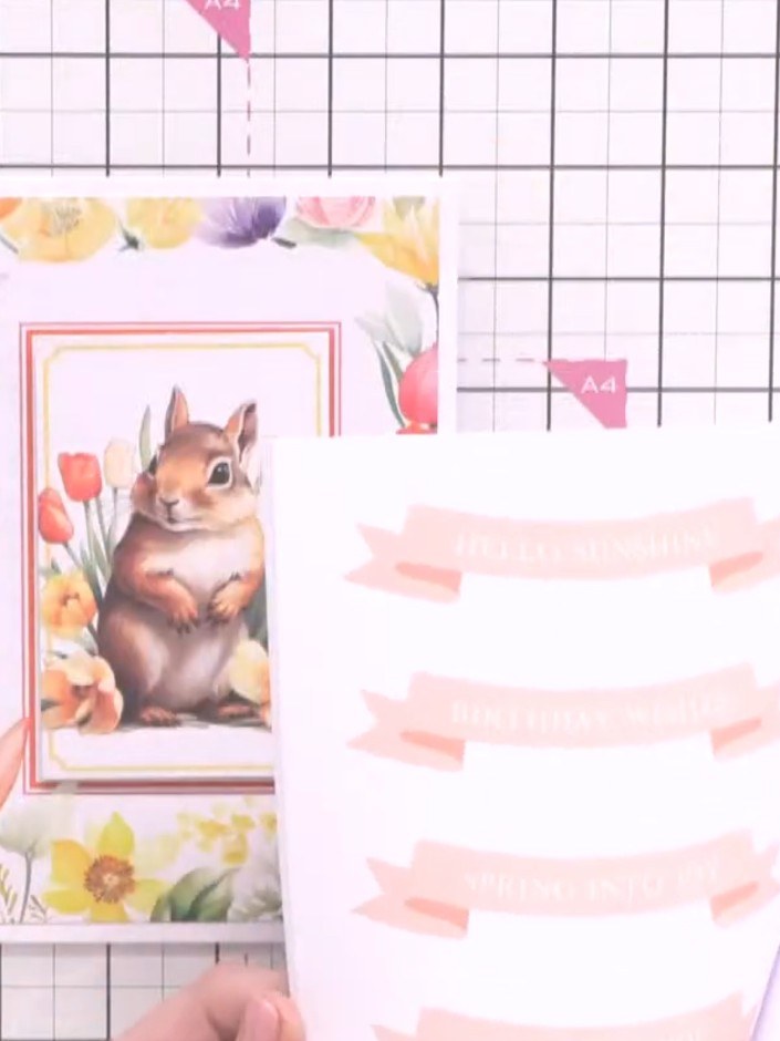 Step 5: Cut out a sentiment banner from the sheet using scissors or the coordinating die. The banner features a pink w