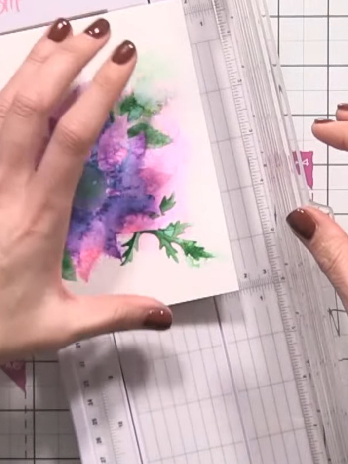 Step 13: Trim your finished stencilled watercolour piece to your desired card size using a paper trimmer. Mount the tri