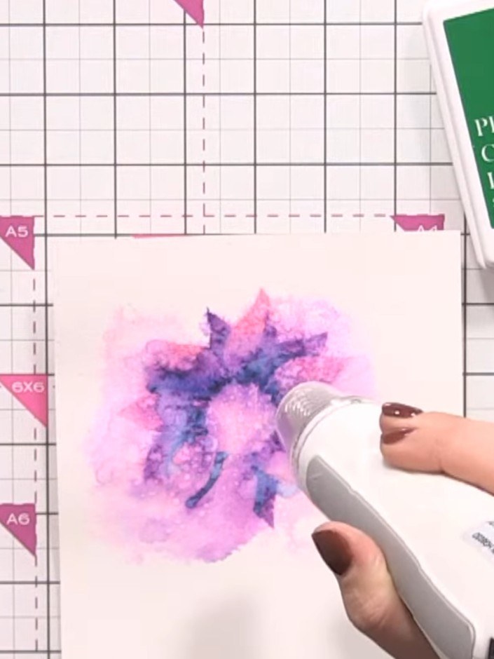 Step 9: Spray the stencilled layer with water using a spray bottle. Dry the layer completely with a heat tool before m