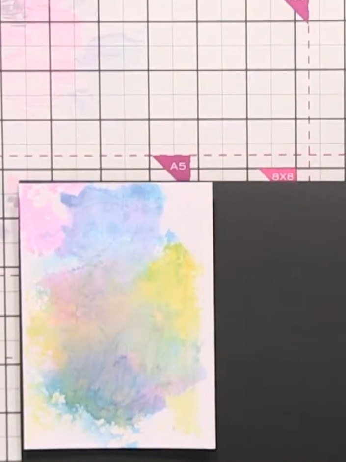 Step 5: Trim the black-backed panel to size using your ruler and trimmer. Position the trimmed panel on your card blan