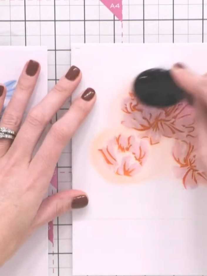 Step 5: Position stencil number five with the leaf elements over your card. Using the blending brush, apply the teal i
