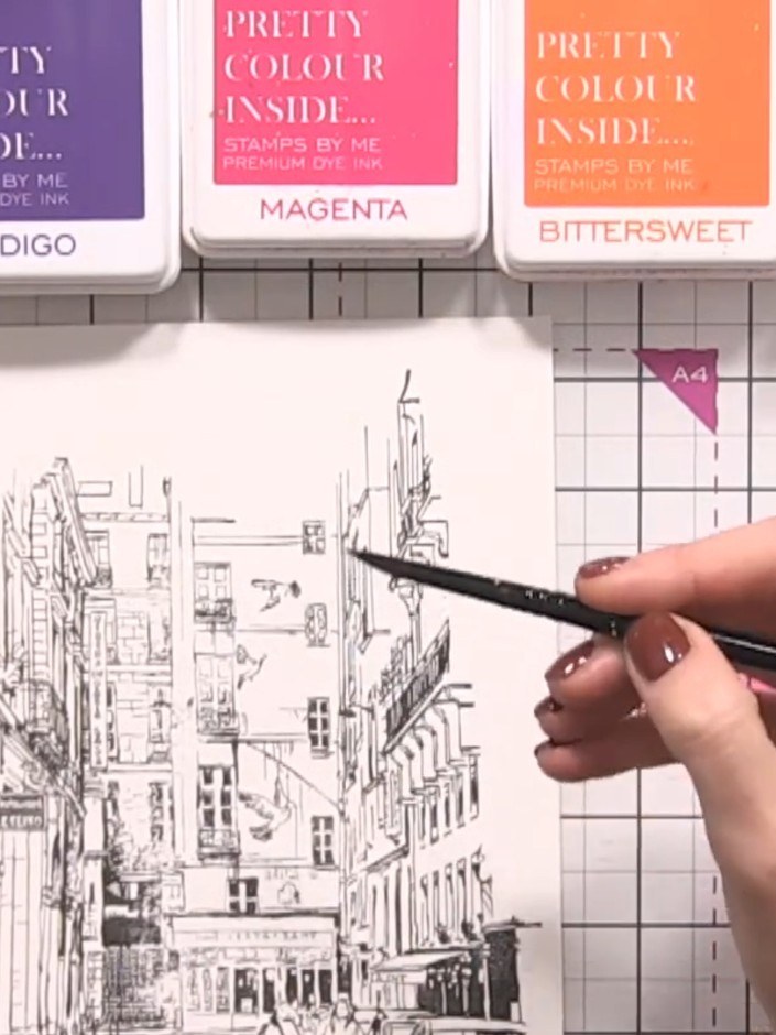 Step 3: Select your first colour ink pad and brush water onto it to activate the colour. Paint blocks of colour into d