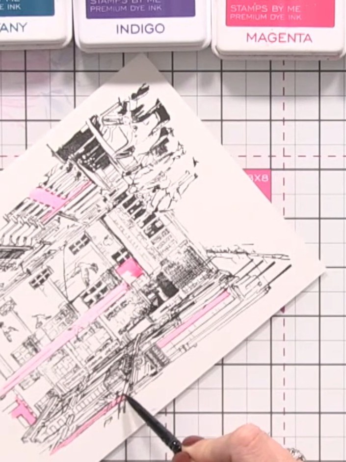 Step 4: Switch to a second colour, such as pink or magenta, and paint more blocks in different areas of the stamped im