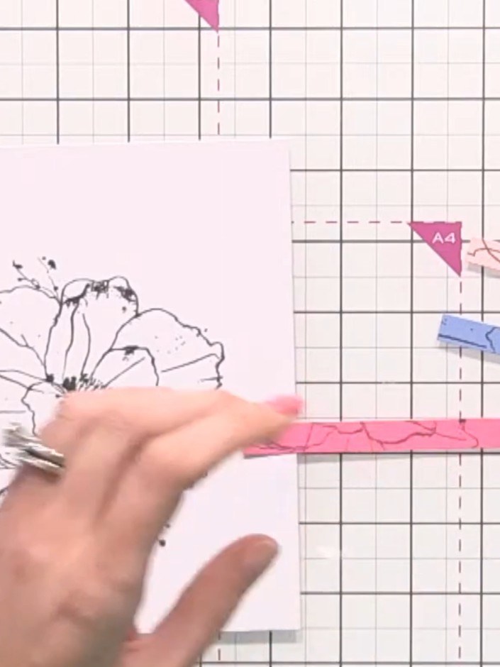Step 3: Stamp the poppy image onto each piece of white card stock in the same position. Hold the stamp steady and ensu