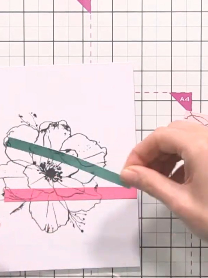 Step 6: Adhere each coloured strip carefully across the flower image, matching the design across the segments. Positio