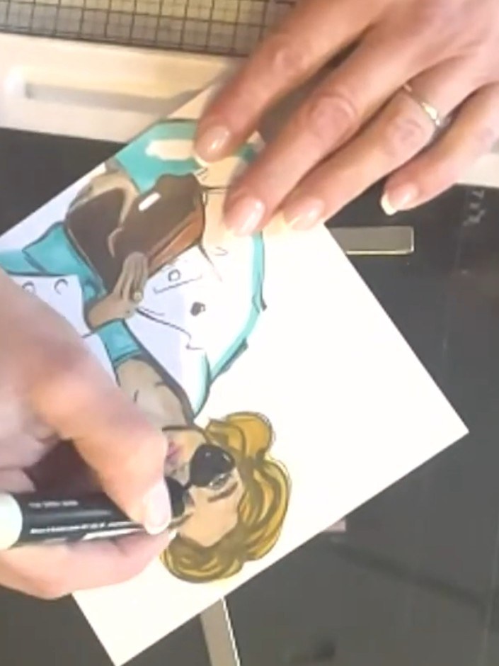 Step 5: Use a white gel pen to add highlights to the eyes and other features. Then use a black pen to define the eyes 