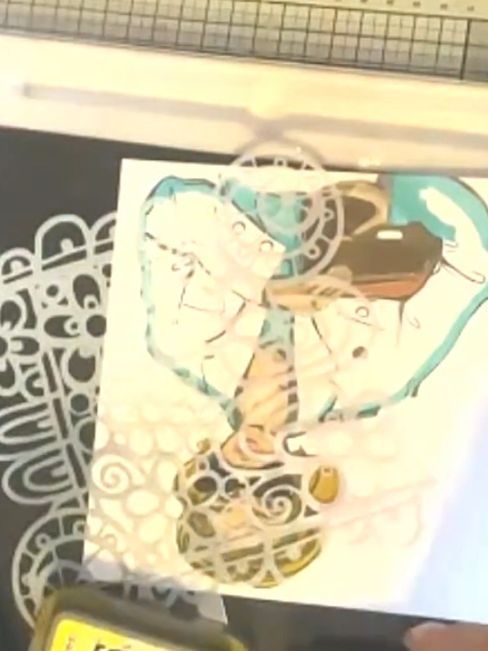 Step 6: Use teal alcohol marker to colour the girl's clothing and accessories. Add colour to her top, trousers, and su