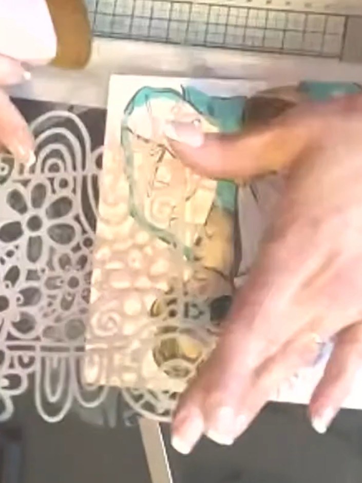 Step 8: Take a large card base and begin building the background by layering decorative paper panels at angles around 