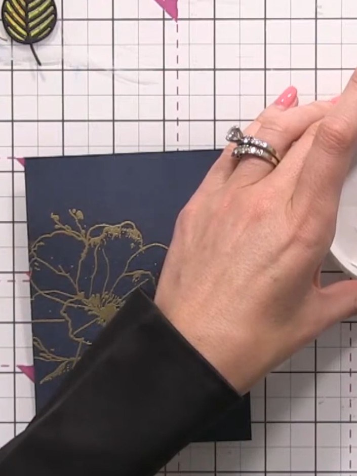 Step 6: Add water to white ink in a palette to create a paintable consistency. Use a brush to mix the ink and water to