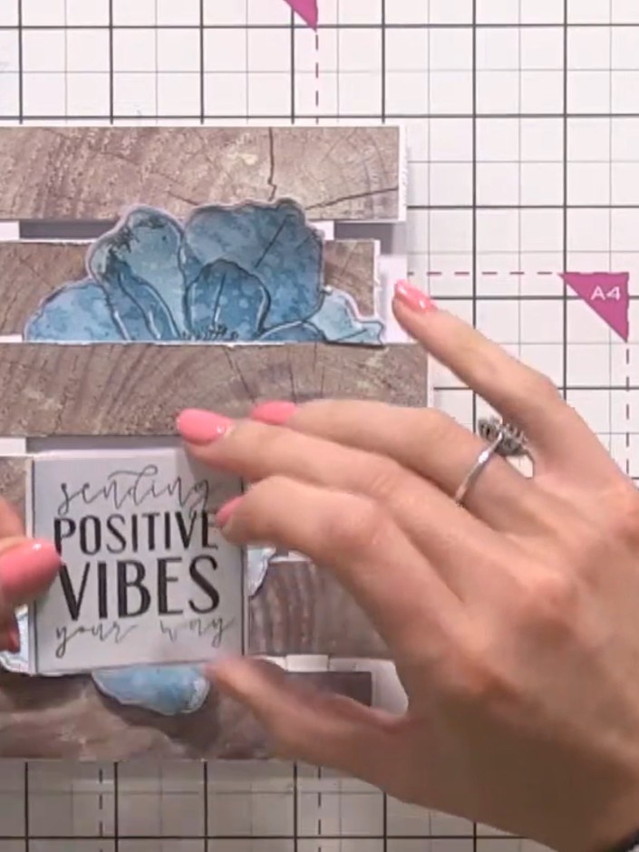 Step 15: Stamp your chosen sentiment onto white card. Add ink blending to the edges of the sentiment panel. Mount the s