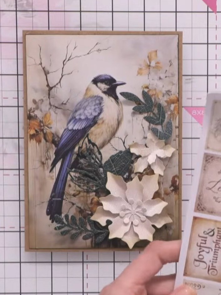 Step 4: Die-cut smaller flower centres from white cardstock. Layer and stack the flower centres together, offsetting t