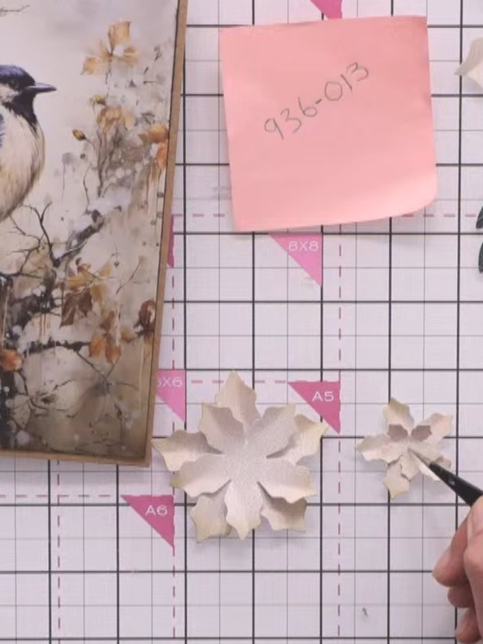 Step 8: Distress the edges of the sentiment by gently whiskering them with scissors to create a feathered effect. Edge