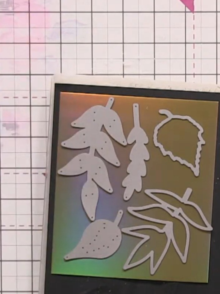 Step 13: Die-cut additional foliage pieces from gold card stock using the floral dies. These will be used as filler ele