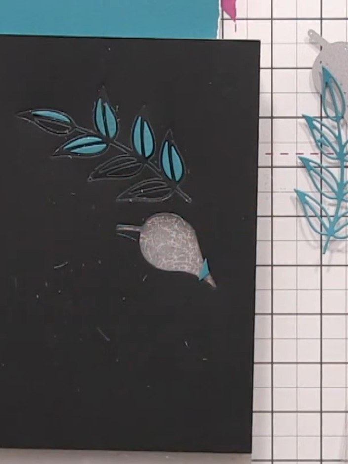 Step 5: Remove the dies from the black card and carefully extract all the cut leaf pieces. Set the cut-out leaves asid