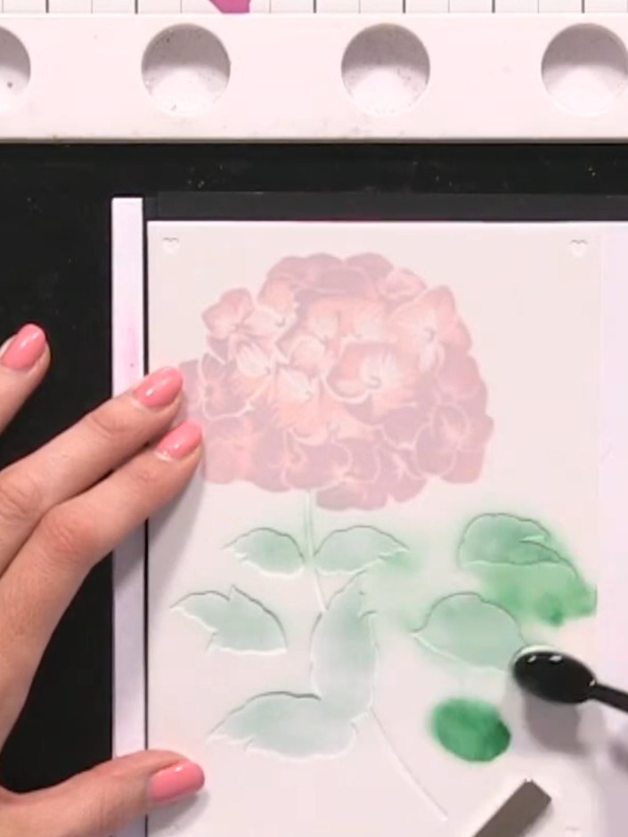 Step 7: Apply a darker purple ink to stencil number five at the top of the hydrangea flower head to add depth and dime
