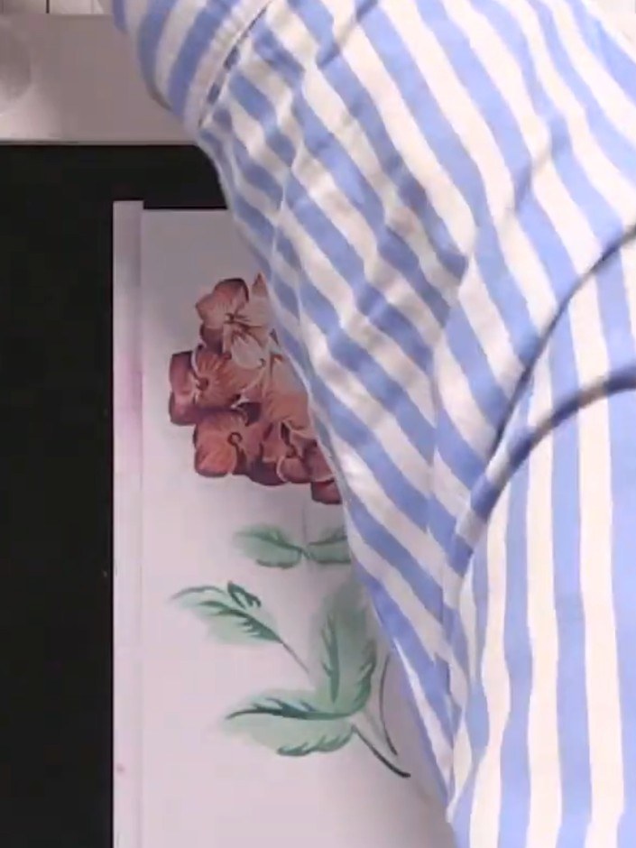 Step 9: Die-cut your stamped floral design using the coordinating die set. Position the die over the top of your stamp