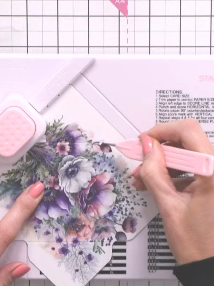 Step 8: Fold up the sides of the envelope along the score lines using a bone folder to create crisp creases.