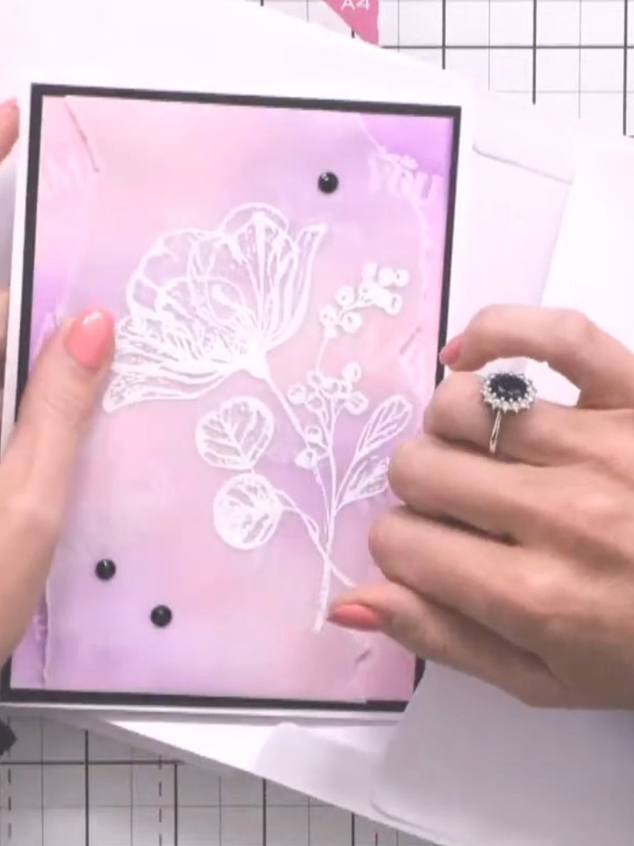 Step 4: Take a third envelope and tape the flap down to create an instant pocket. This page will hinge in the opposite