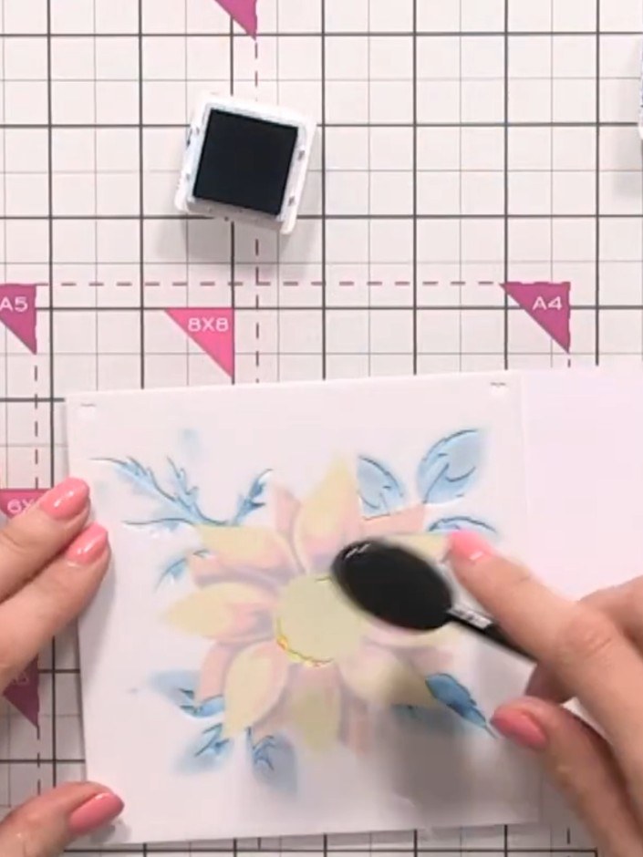 Step 3: Apply black ink through the stencil using an ink blending brush, tapping off excess ink before applying to the