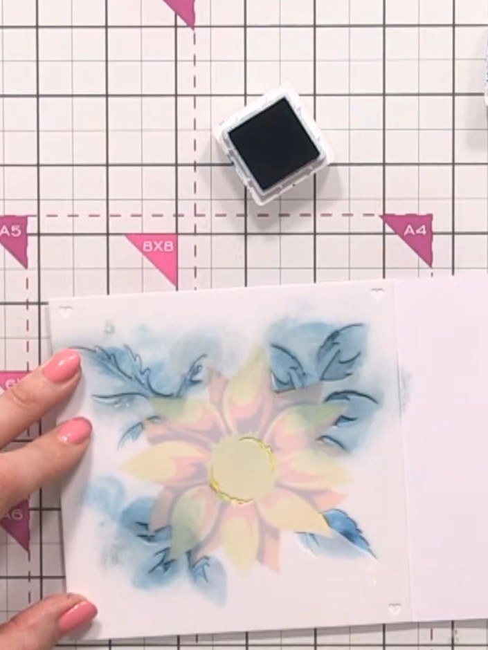 Step 4: Carefully remove the stencil from the vellum and set it aside. Allow the ink to dry completely before proceedi