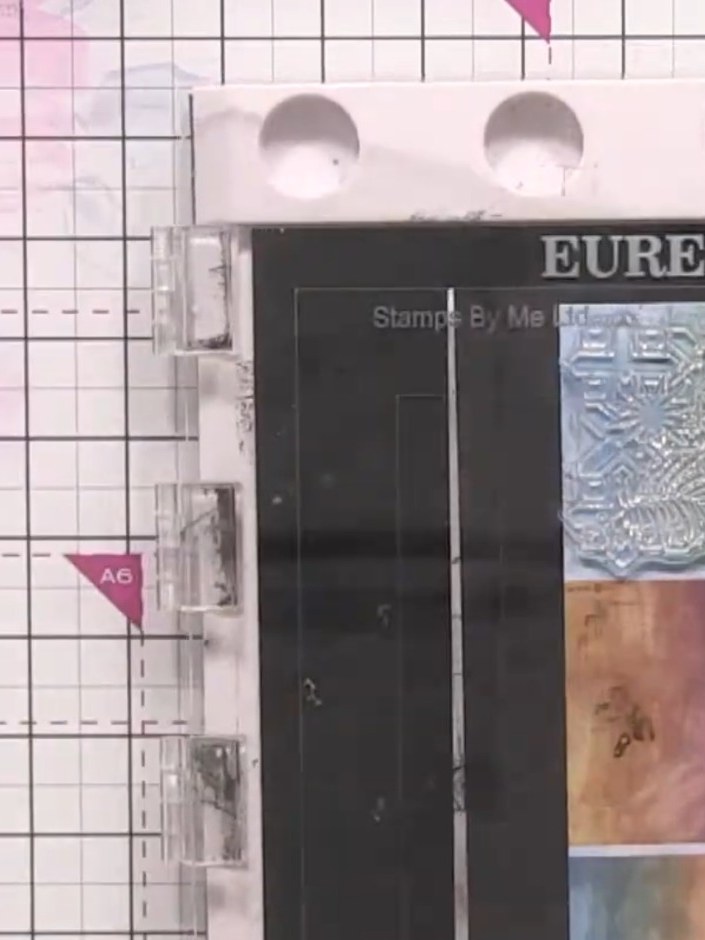 Step 3: Stamp the tile design onto your card or paper using the Eureka 101 stamping platform, pressing down firmly to 