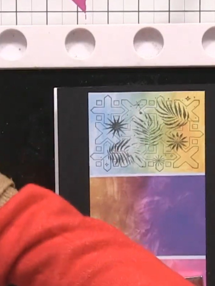 Step 4: Repeat the stamping process to create a row of three tiles across the card front, maintaining even spacing bet