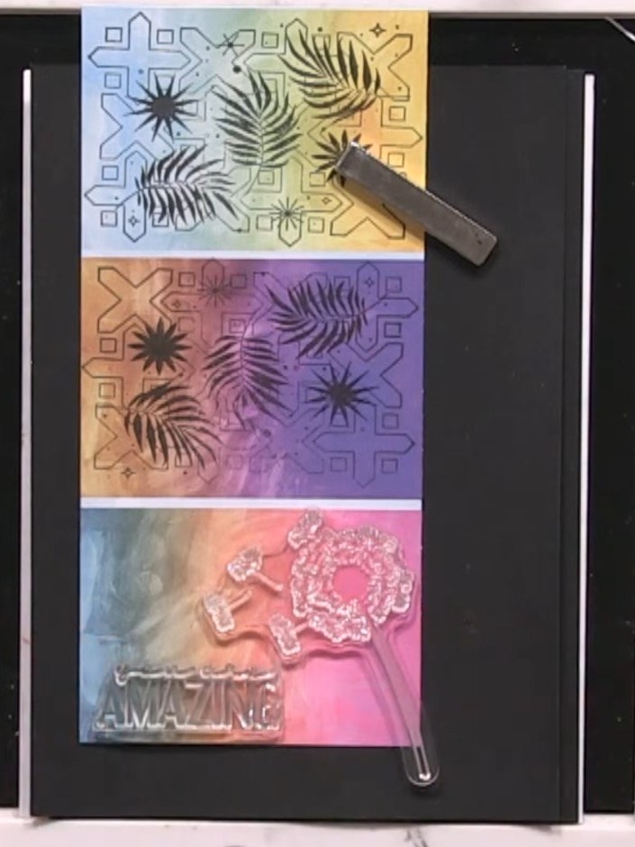 Step 7: Add a sentiment stamp to the lower portion of the card to complete your design. Position the 'AMAZING' stamp o
