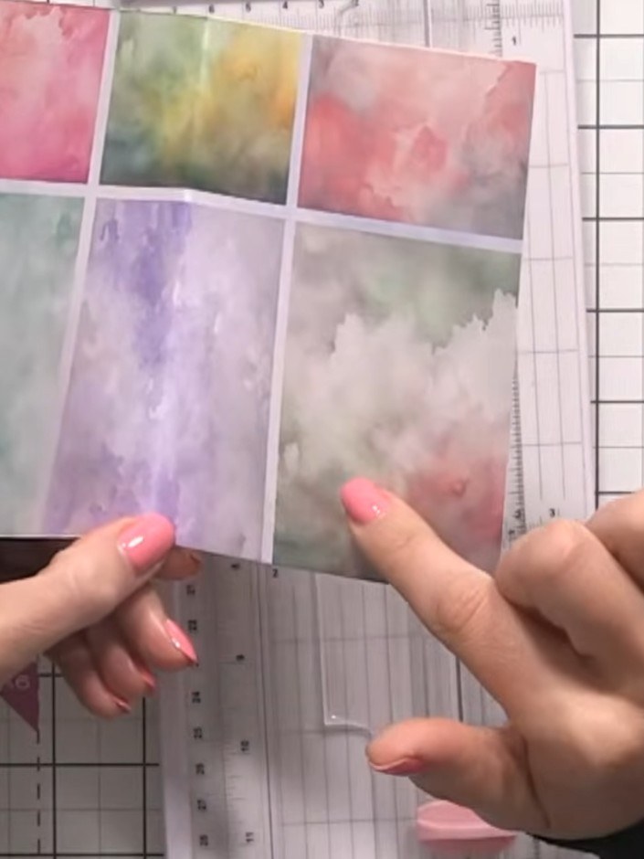 Step 4: Take one of the remaining vellum pieces and fold it in half to create a small decorative card from the offcut.