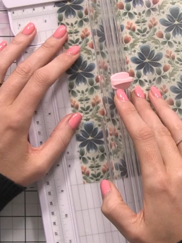 Step 1: Cut a strip of vellum approximately 1.5 inches (4 cm) wide using your paper trimmer to create the belly band f