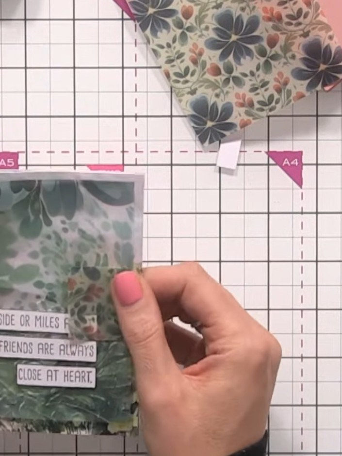 Step 3: Remove the vellum from the card base and fold it along the score lines. Pinch the folds with your fingers to c