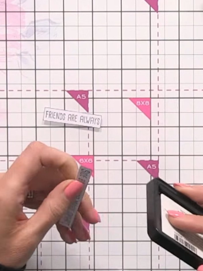 Step 7: Secure each sentiment strip to the card using double-sided tape, keeping them as straight as possible. Positio