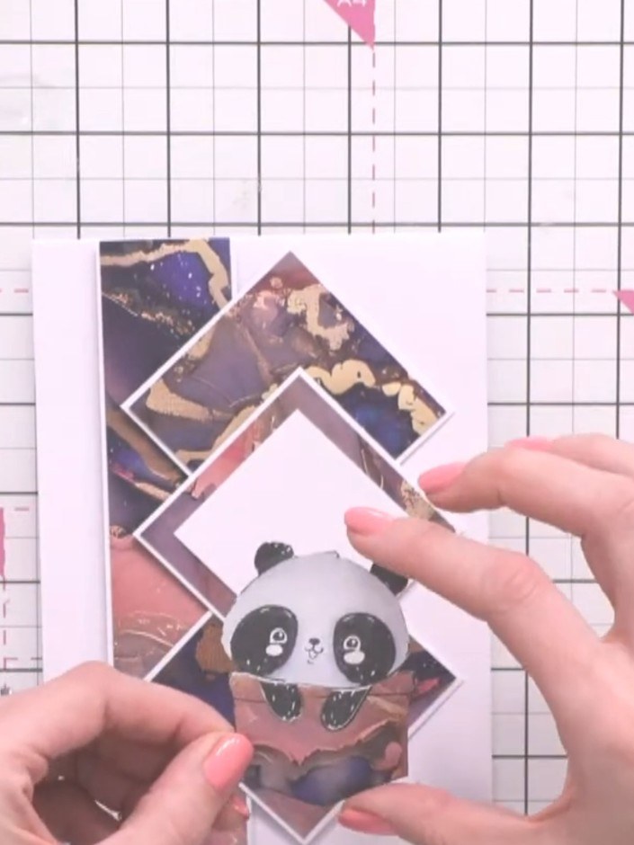 Step 10: Cut a 2 by 2 inch white square. Position it in the centre of the card to break up the patterned background.