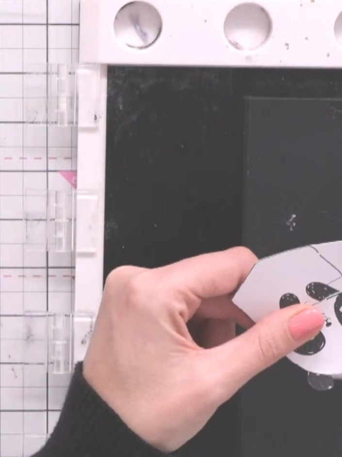 Step 5: Cut the patterned paper into a 2.5 by 2.5 inch square using a guillotine.