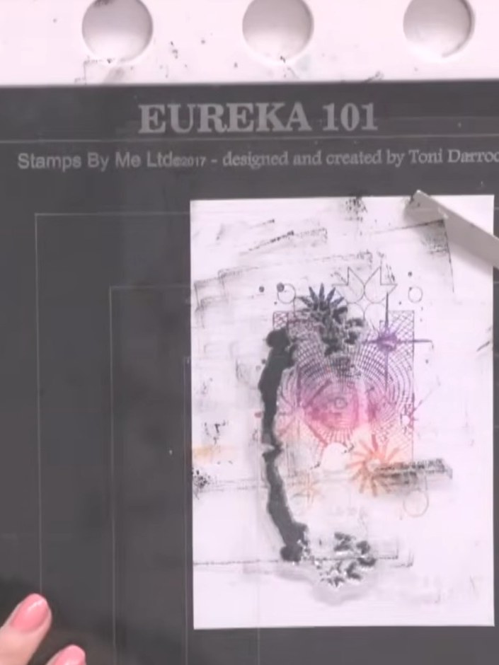 Step 10: Add a sentiment stamp to your card. Position the 'with love' stamp from the Eureka 101 stamp set onto your car