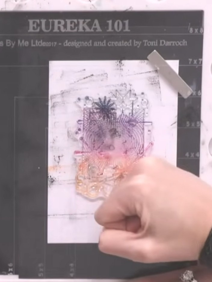 Step 3: Ink up the top of the stamp with teal ink, the middle with pink ink, and the bottom with orange ink to create 