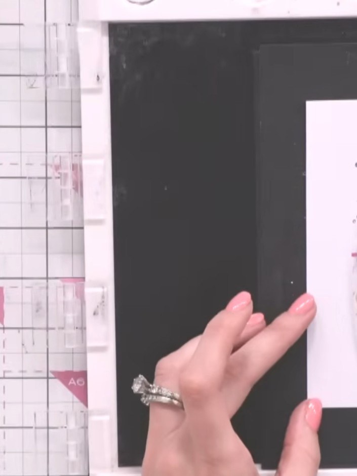 Step 6: Ink up the reflection stamp completely using black ink, ensuring even coverage across the entire stamp surface
