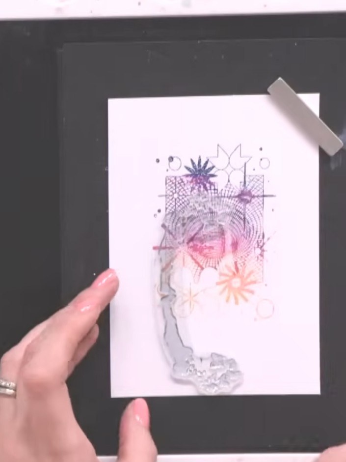 Step 7: Stamp the reflection stamp in the centre of your white card panel to create the butterfly image. The stamp wil