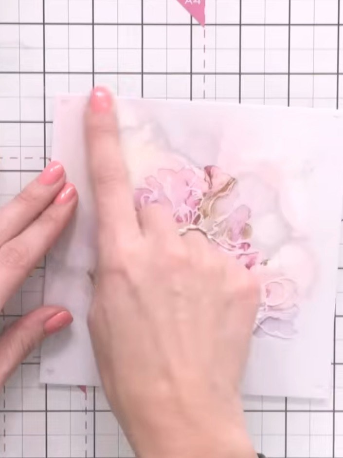 Step 5: Position the second stencil over your paper, lining it up with the first stencilled design. You can choose to 