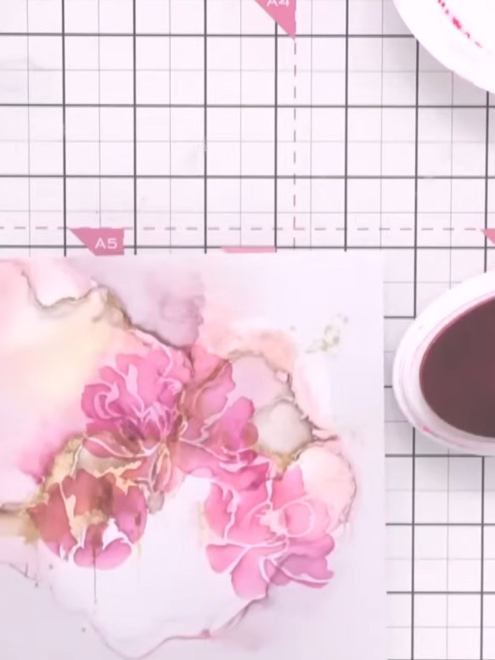 Step 7: Continue layering with stencils three, four, five and six using the same pink ink. Gradually build up the dept