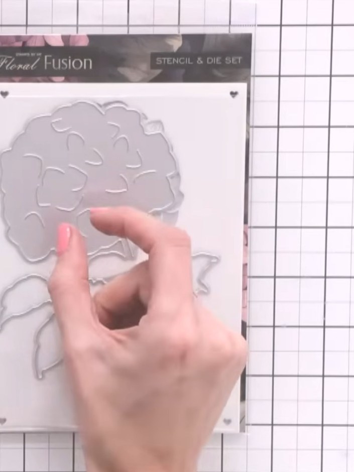 Step 2: Ink through the layering stencil onto your card base using your chosen colours. Position the hydrangea stencil