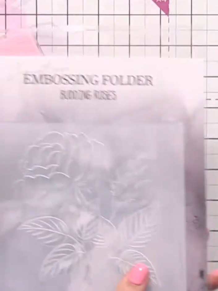 Step 1: Cut your watercolour card stock to size using your die-cutting machine with the white rose embossing folder. P