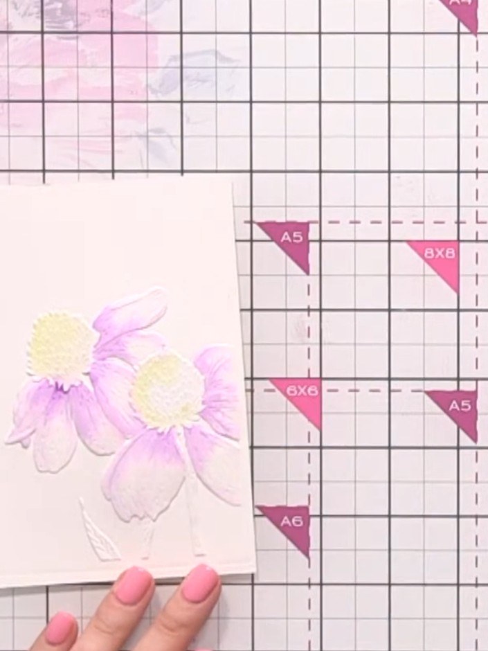 Step 8: Using a brush with orange watercolour, add shadows to one side of the flower petals to create the effect of li
