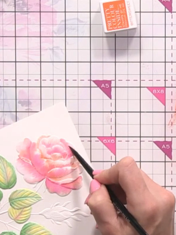 Step 11: Soften any harsh lines by using a damp brush to gently pounce over the edges of the watercoloured areas, blend