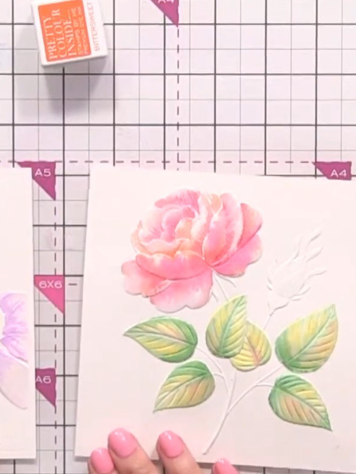Step 12: Allow the watercoloured embossed panels to dry completely. Once dry, trim each panel and mount onto your card 