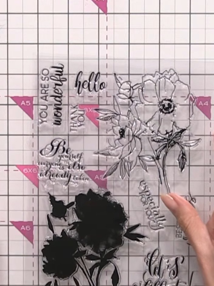 Step 1: Place the clear lamination stamp face down on white card. Pick up the stamp to see the impression left on the 